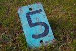 Rusty railway sign