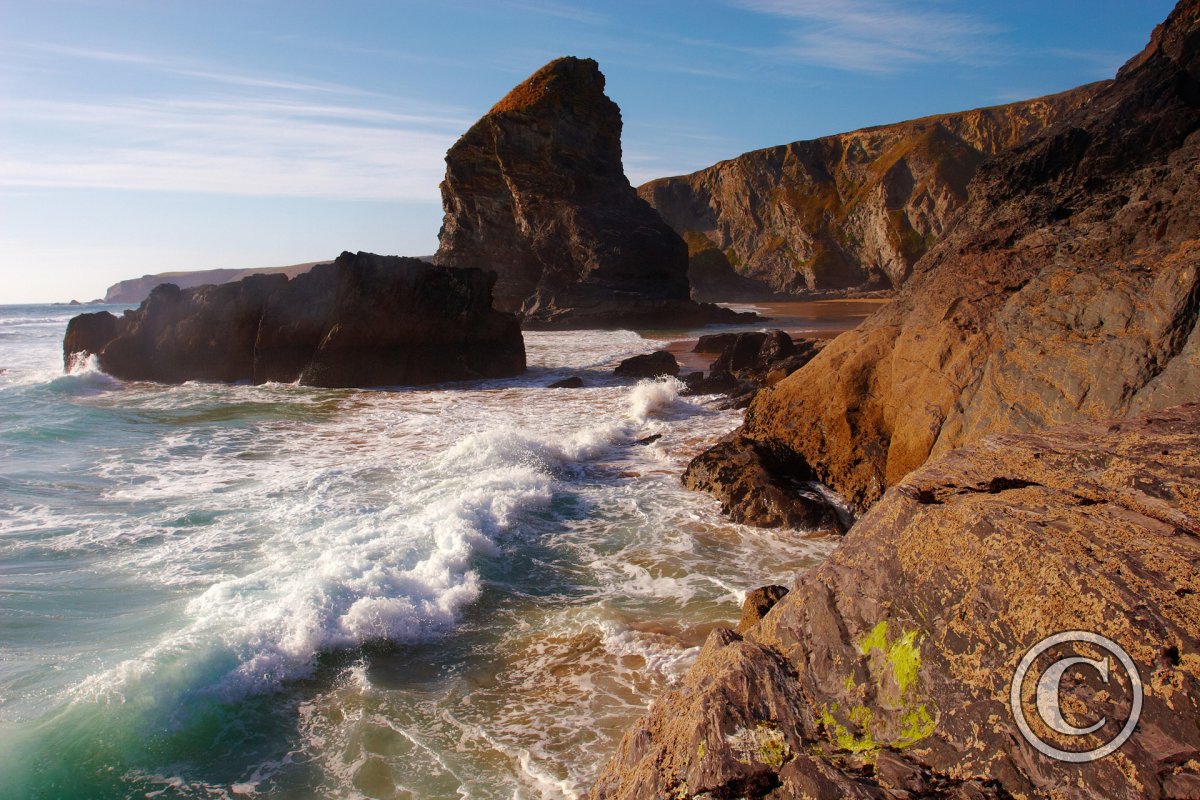 Waves breaking on the rocky shore at Bedruthan Steps | Bedruthan Steps